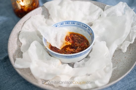 rice paper dipping into chili crunch