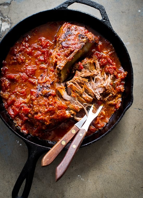 Juicy Asian Oven Pulled Pork in a skillet