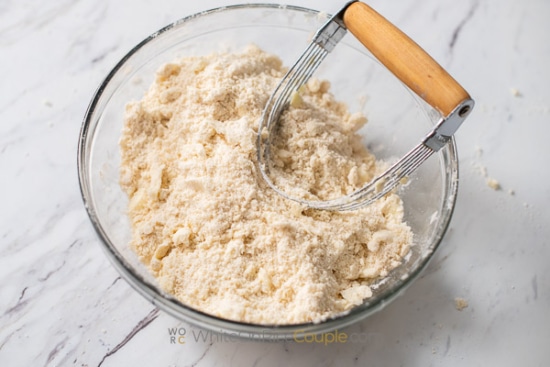 cutting butter with pastry cutter