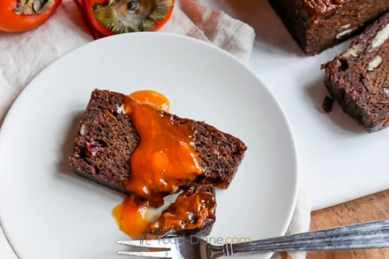 slice of persimmon bread topped with persimmon pulp