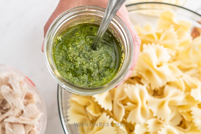 pesto chicken recipe with pasta on whiteonricecouple.com