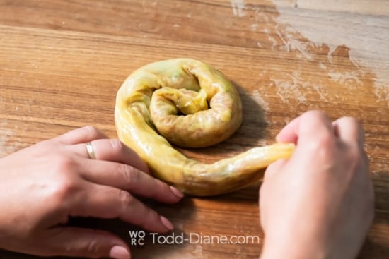 Curling into a spiral