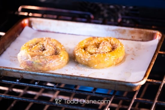 Uncooked spirals going into oven