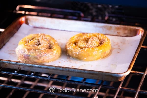 Uncooked spirals going into oven