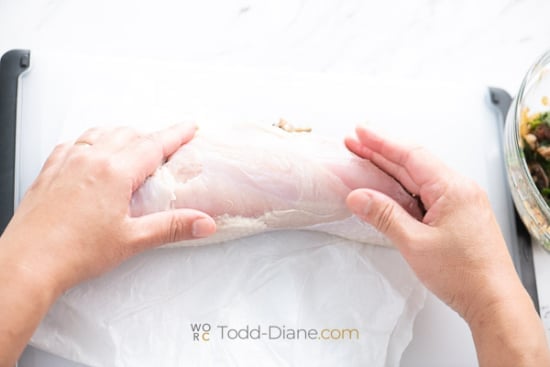 rolling stuffed raw turkey breast