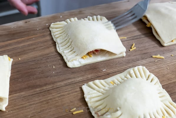 crimping edges of puff pastry with fork
