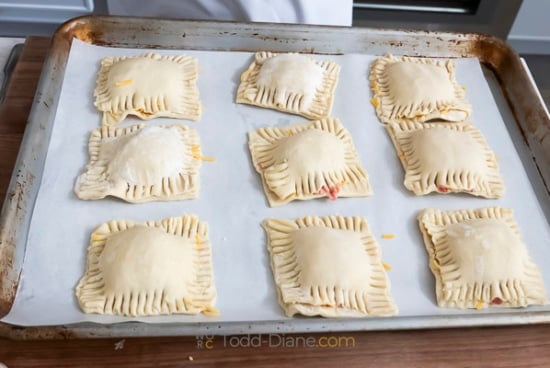 raw pastries on sheet pa