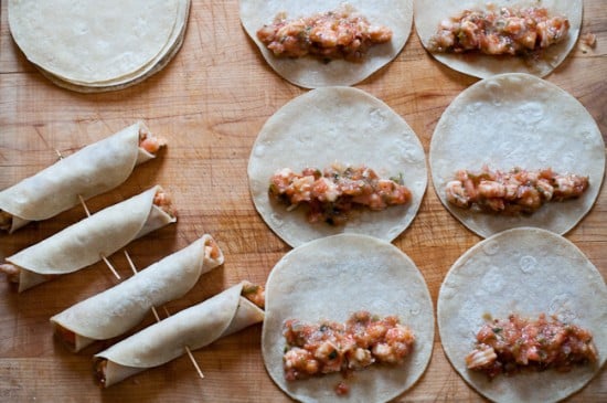 making shrimp rolled tacos 