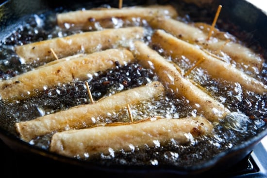 crispy taquitos frying 