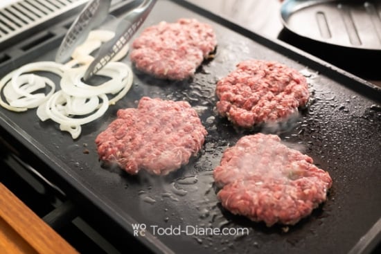Adding onions to griddle