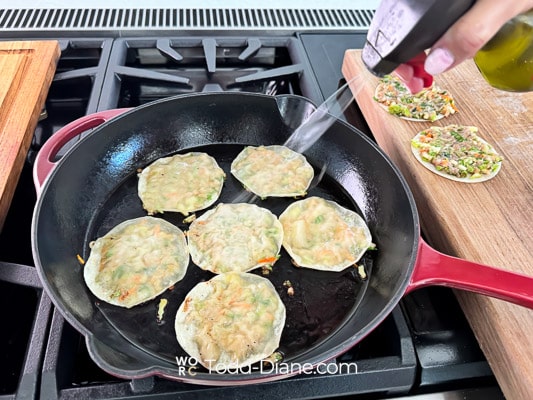 light oil spray over the dumplings