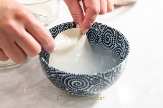 dipping wrapper in water