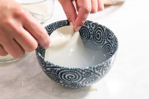 dipping wrapper in water