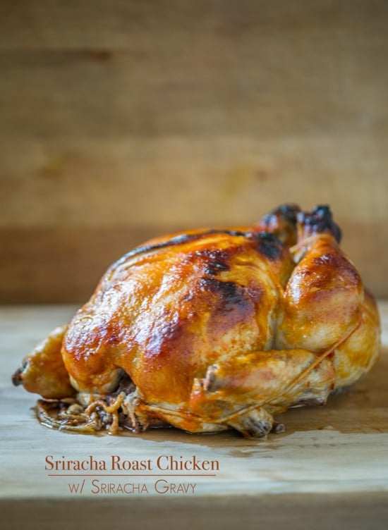 Sriracha Roast Chicken Recipe with Sriracha Gravy on a cutting board