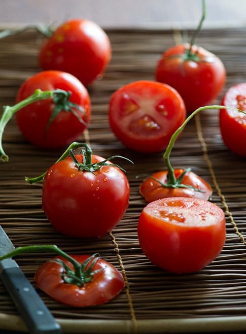 Vegetarian stuffed tomatoes with quinoa and tofu | @whiteonrice