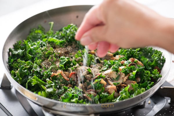 adding kale and seasonings