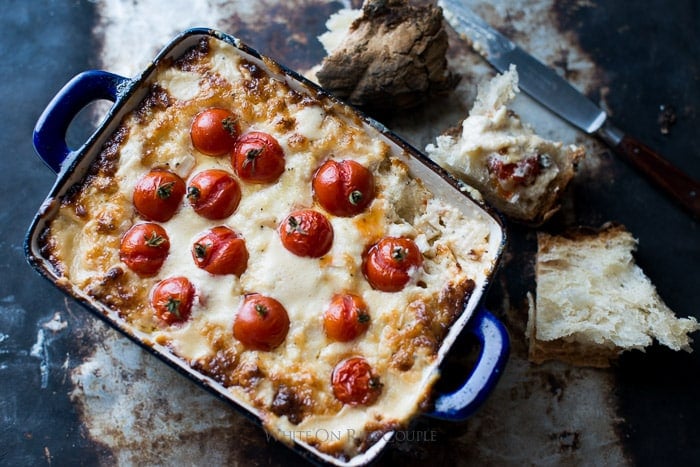 Roasted Tomato and Sweet Onion Cheese Dip in a baking dish