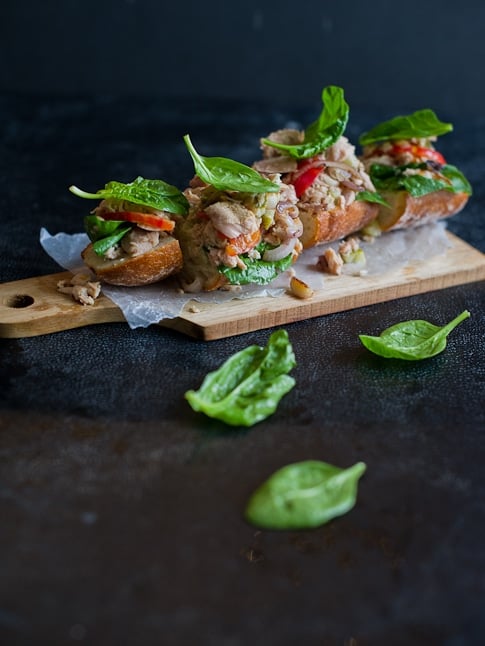 tuna spinach bruschetta recipe on cutting board