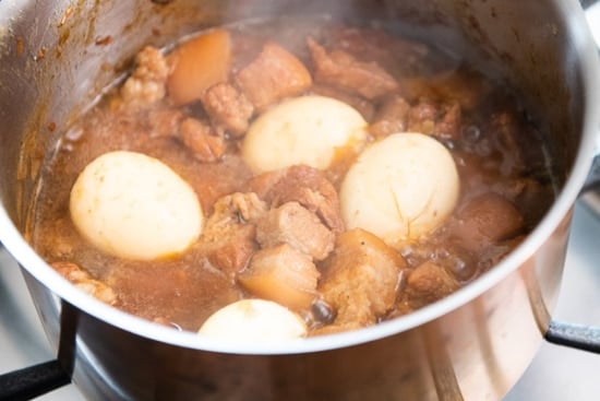 Hard boiled eggs in the braised pork mixture thịt kho trứng