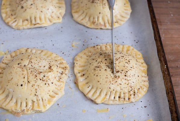 slicing top of raw pastry