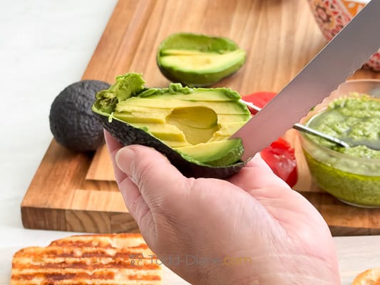 slicing avocado and tunacado prep