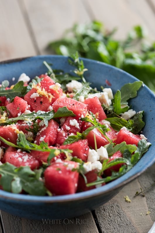Watermelon Salad Recipe with Arugula, Feta, Mint or Fresh Herbs in a bowl