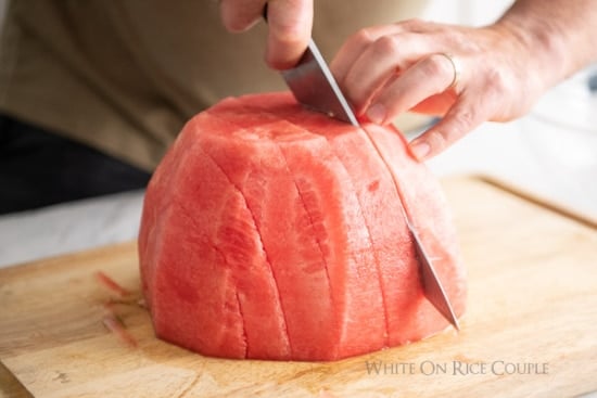 cutting thick watermelon slices