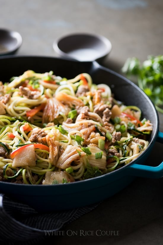 Korean Zucchini Noodles Stir Fry with Pork And Korean Kim Chi in a skillet