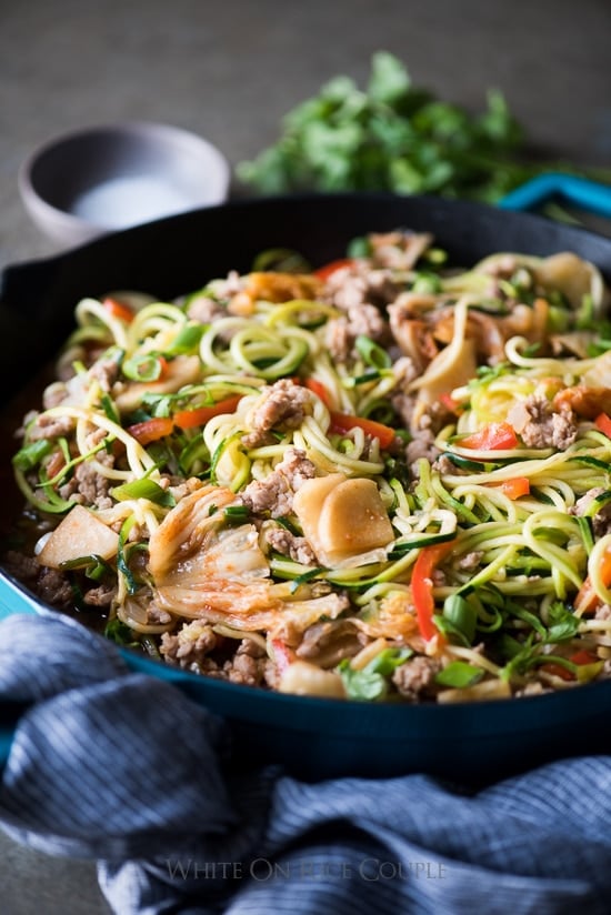 Korean Zucchini Noodles Stir Fry with Pork And Korean Kim Chi in a skillet