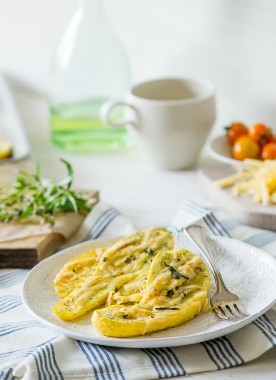 Roasted Zucchini Recipe with Cheese and Herbs on a plate